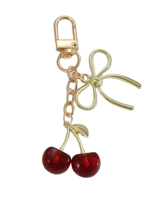 Bijou de Sac Cerise Résine Céria - Noeud Féminin & Finition Dorée - Accessoire Chic